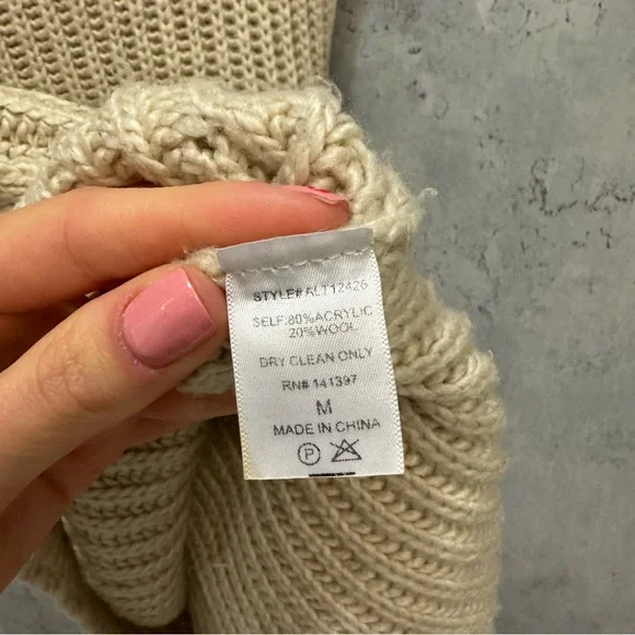 Women's Cream Sleeveless Turtleneck Sweater - Picture 6 of 6